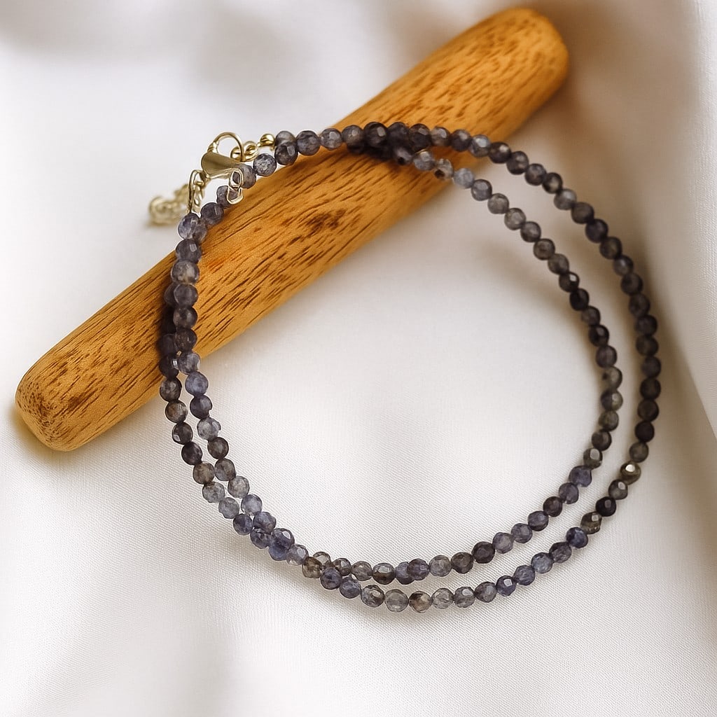 Natural Iolite Gemstone 8 MM Round Smooth Beads Necklace: Natural Iolite Gemstone 8 MM Round Smooth Beads Necklace Gemstone : Iolite Shape : Round Beads Beads Size : 3 MM Beads Type : Micro Faceted Necklace Length : 17.5 Inches + 2.5 Inches Adjustable Cha