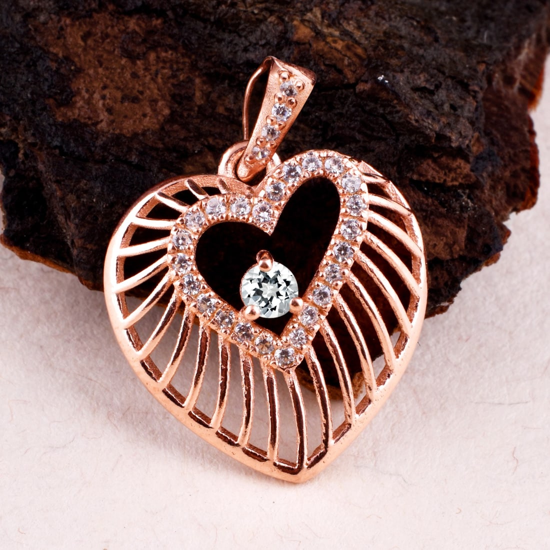 Natural White Topaz & Diamond 14 KT Rose Gold Pendant: Natural White Topaz & Diamond 14 KT Rose Gold Pendant Jewelry Type : Pendant Main Stone : White Topaz & Diamond Main Stone Shape & Size : Round 3 MM Main Stone Color : White Diamond Shape & Size :