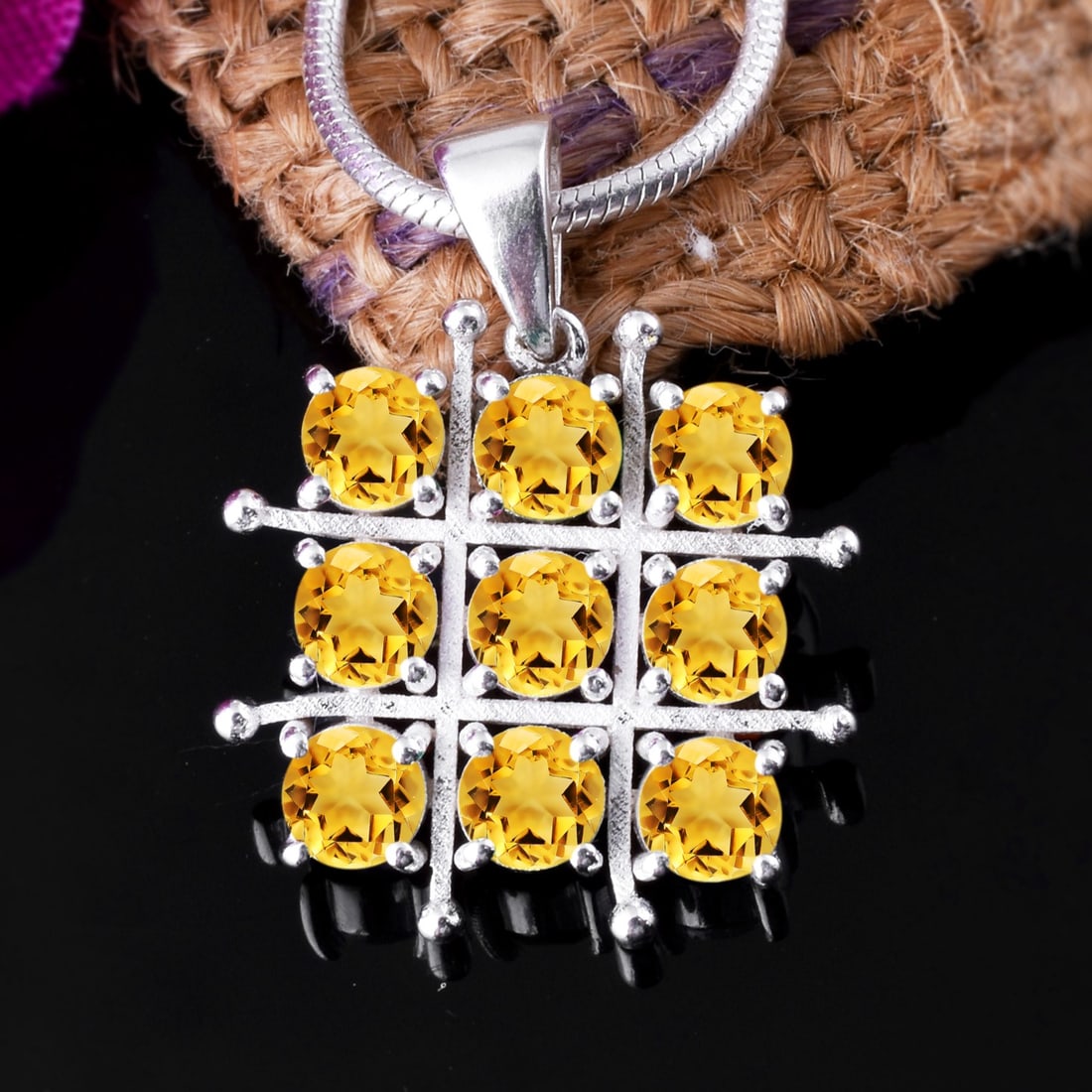 Natural Citrine 14 KT White Gold Pendant: Natural Citrine 14 KT White Gold Pendant Jewelry Type : Pendant Main Stone : Citrine Main Stone Shape & Size : Round 4 MM (9 Pieces) Main Stone Color : Yellow