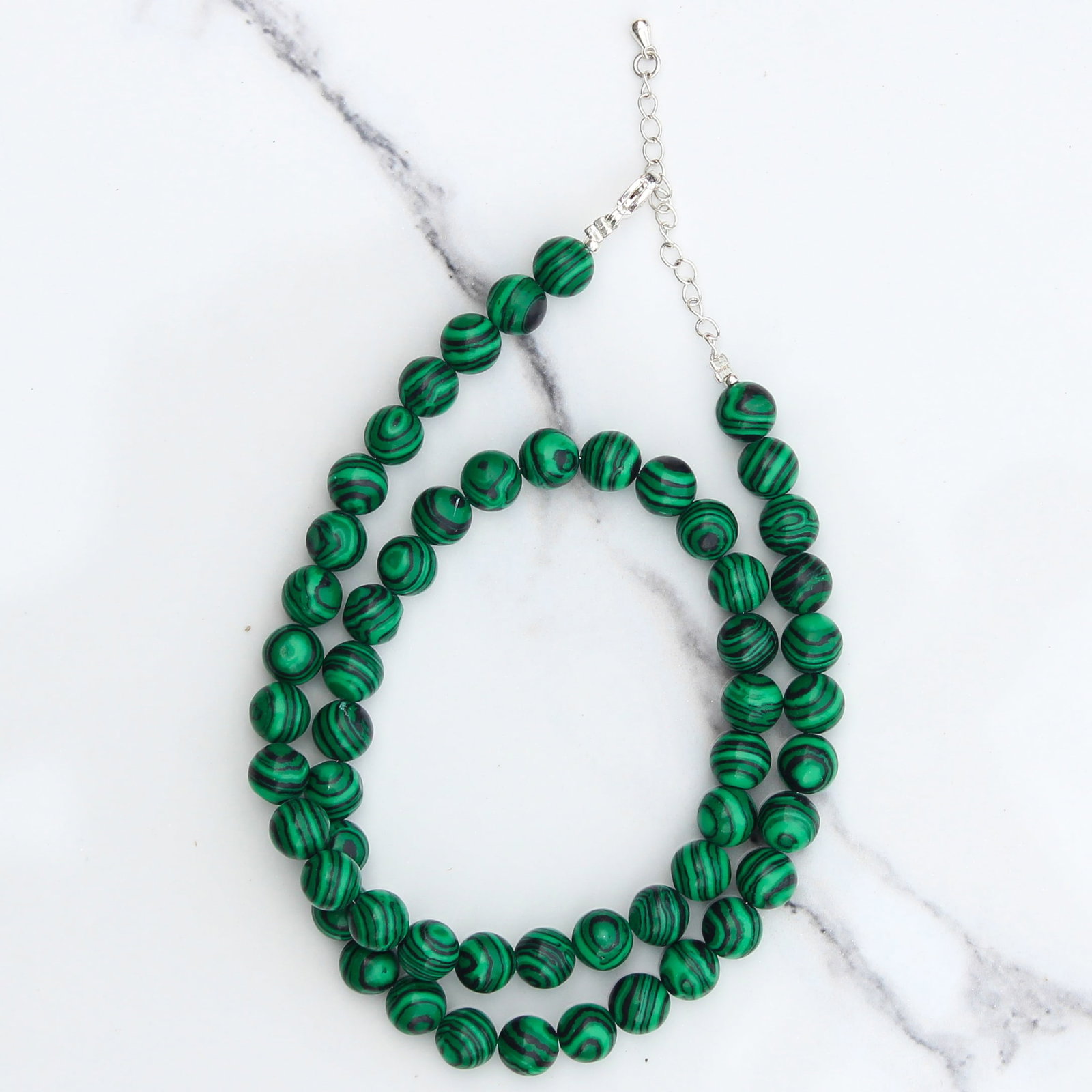 Natural Malachite 8 MM Round Smooth Beads Necklace: Natural Malachite 8 MM Round Smooth Beads Necklace Gemstone : Malachite Shape : Round Beads Beads Size : 8 MM Beads Type : Smooth Necklace Length : 17.5 Inches + 2.5 Inches Adjustable Chain