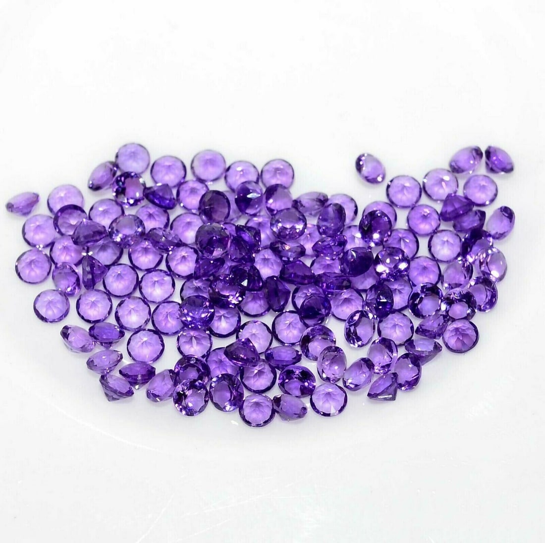 Amethyst 2.5 MM Round Faceted Cut 100 Pieces: Natural Amethyst 2.5 MM Round Faceted Cut 100 Pieces Gemstone : Amethyst Shape : Round Size : 2.5 MM Color : Purple Type : Faceted Cut Quantity : 100 Pieces Weight : 8