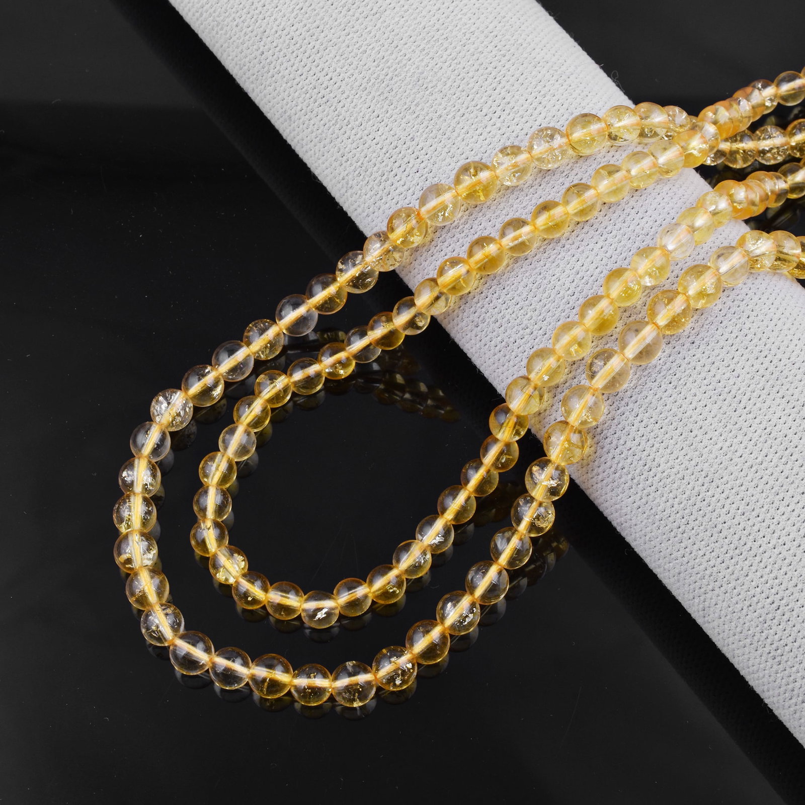 Natural Citrine Necklace 6 MM Round Smooth 2 String Beads Gemstone: Natural Citrine Gemstone 6 MM Round 2 Strings Smooth Beads Adjustable Necklace Product Type : Necklace Main Stone : Citrine Main Stone Shape : Round Main Stone Size : 6 MM Beads Type : Smooth