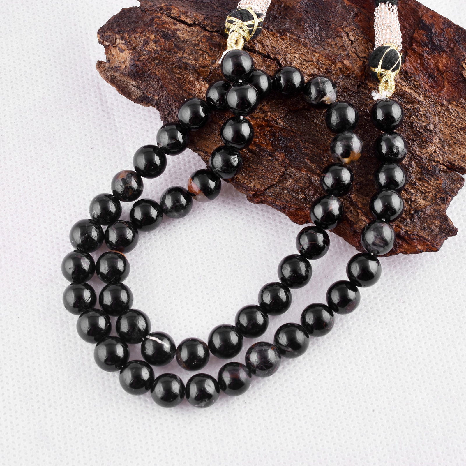 Natural Black Tourmaline Necklace 8 MM Round Smooth Beads Gemstone: NATURAL BLACK TOURMALINE GEMSTONE 8 MM ROUND SMOOTH BEADS ADJUSTABLE NECKLACE PRODUCT TYPE : NECKLACE MAIN STONE : BLACK TOURMALINE MAIN STONE SHAPE : ROUND MAIN STONE SIZE : 8 MM BEADS TYPE : SMOO