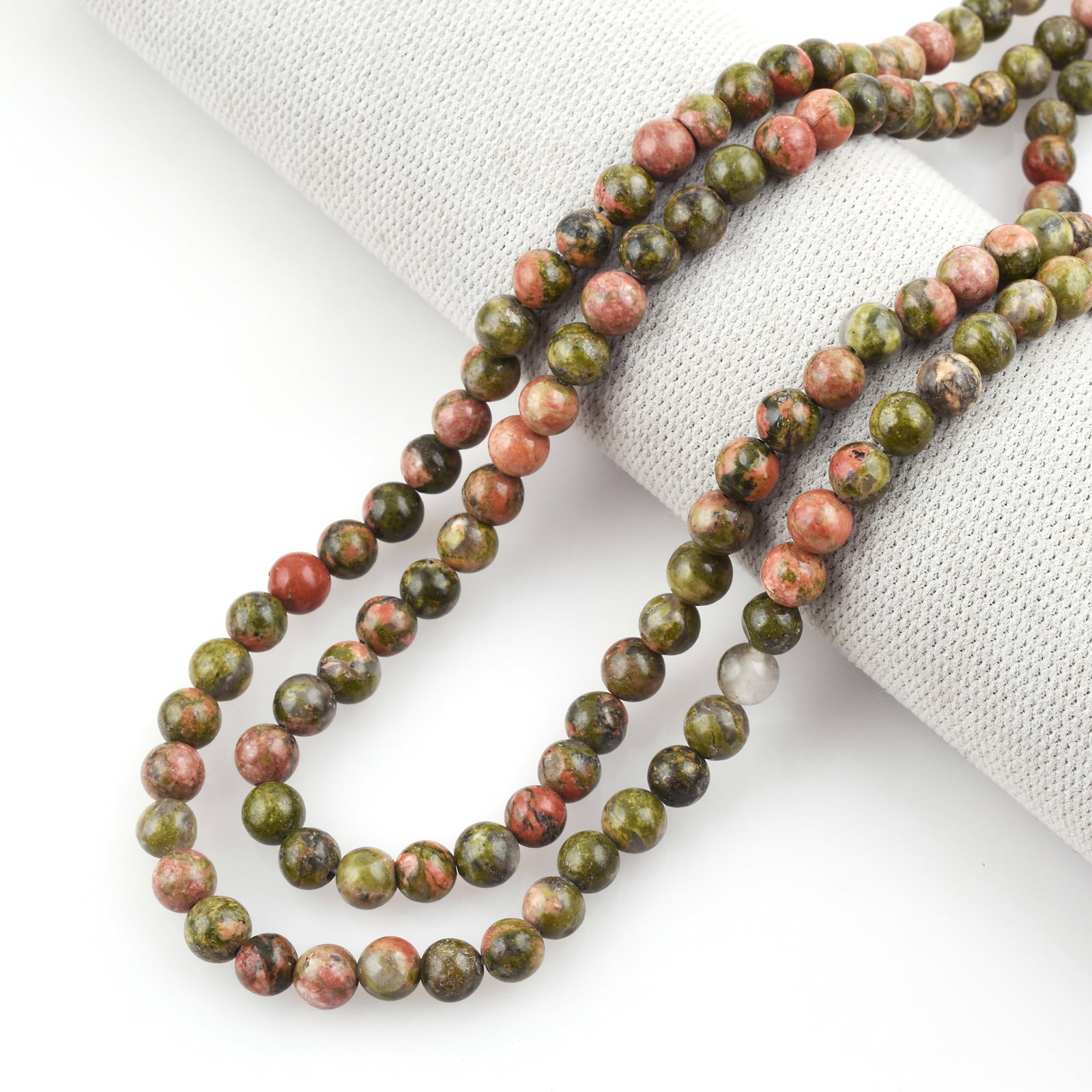 Natural Unakite Necklace 6 MM Round Smooth 2 String Beads Gemstone: Natural Unakite Gemstone 6 MM Round 2 Strings Smooth Beads Adjustable Necklace Product Type : Necklace Main Stone : Unakite Main Stone Shape : Round Main Stone Size : 6 MM Beads Type : Smooth