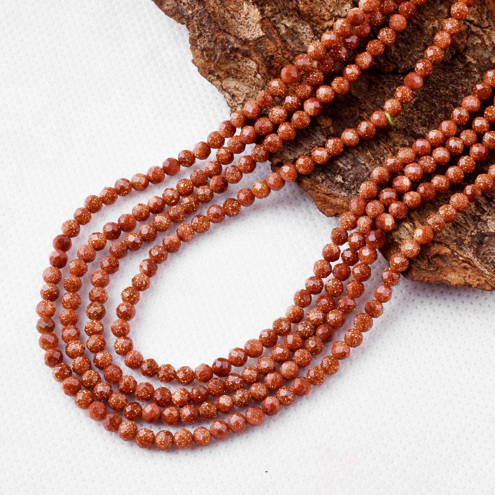 Natural Golden Sandstone 3 MM Round Faceted 4 String Beads Necklace: Natural Golden Sandstone 3 MM Round Faceted 4 String Beads Necklace Product Type : Necklace Main Stone : Golden Sandstone Main Stone Shape : Round Main Stone Size : 3 MM Beads Type : Faceted