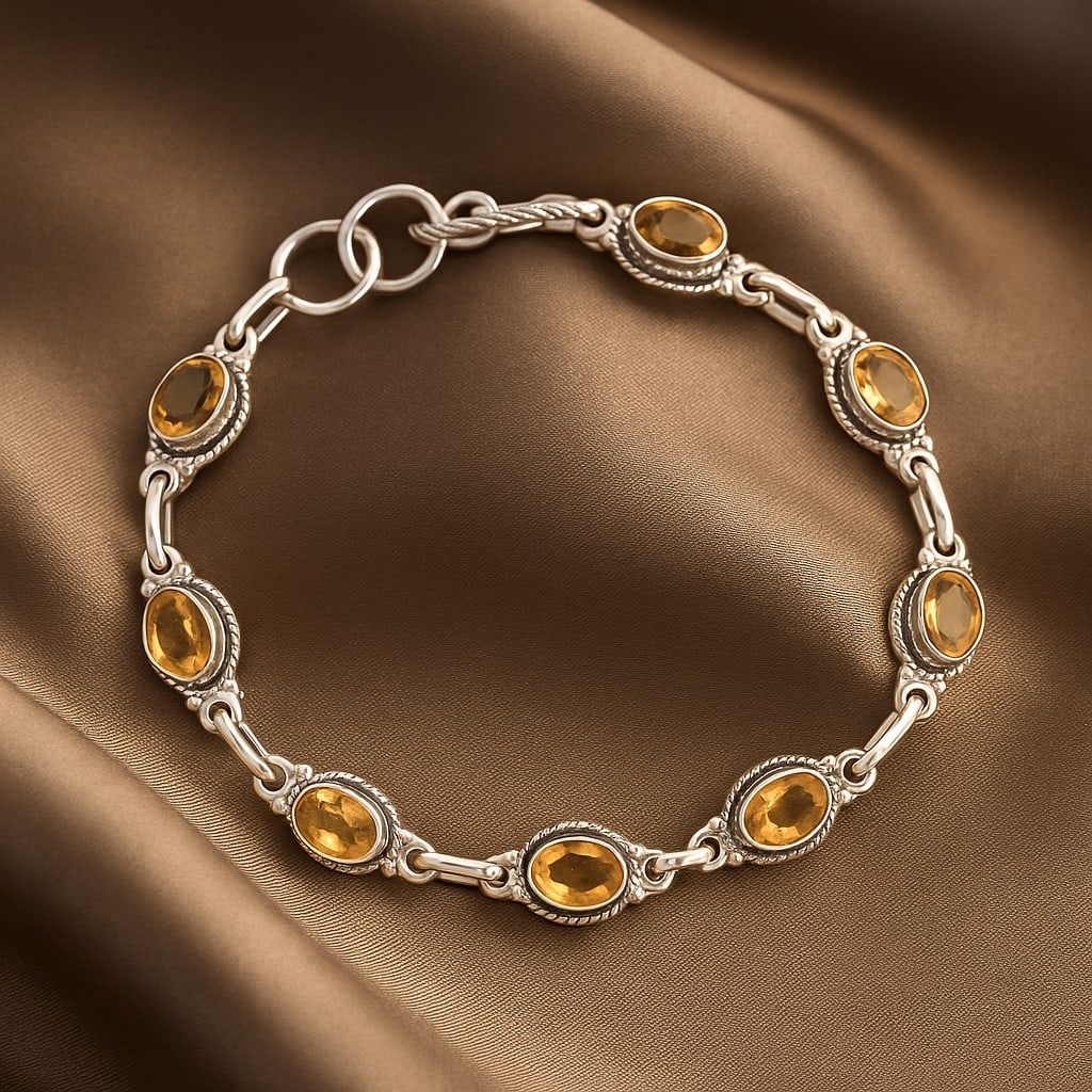 CITRINE 92.5 STERLING SILVER BRACELET: CITRINE 92.5 STERLING SILVER BRACELET Product Type : BRACELET Main Stone : CITRINE Main Stone Shape : OVAL Main Stone Size : 7X5 MM Main Stone Color : YELLOW Metal : STERLING SILVER Metal Purity : 92.