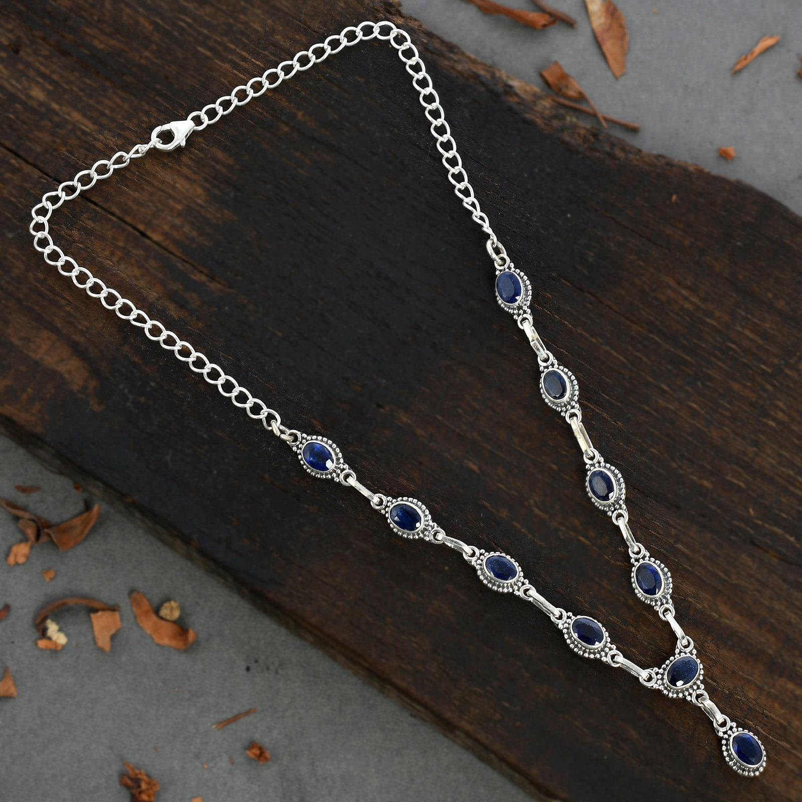 BLUE SAPPHIRE TOPAZ GEMSTONE 92.5 STERLING SILVER NECKLACE: BLUE SAPPHIRE TOPAZ GEMSTONE 92.5 STERLING SILVER NECKLACE Product Type : NECKLACE Main Stone : BLUE SAPPHIRE Main Stone Shape : OVAL Main Stone Size : 7X5 MM Main Stone Color : BLUE Metal : STERLING 
