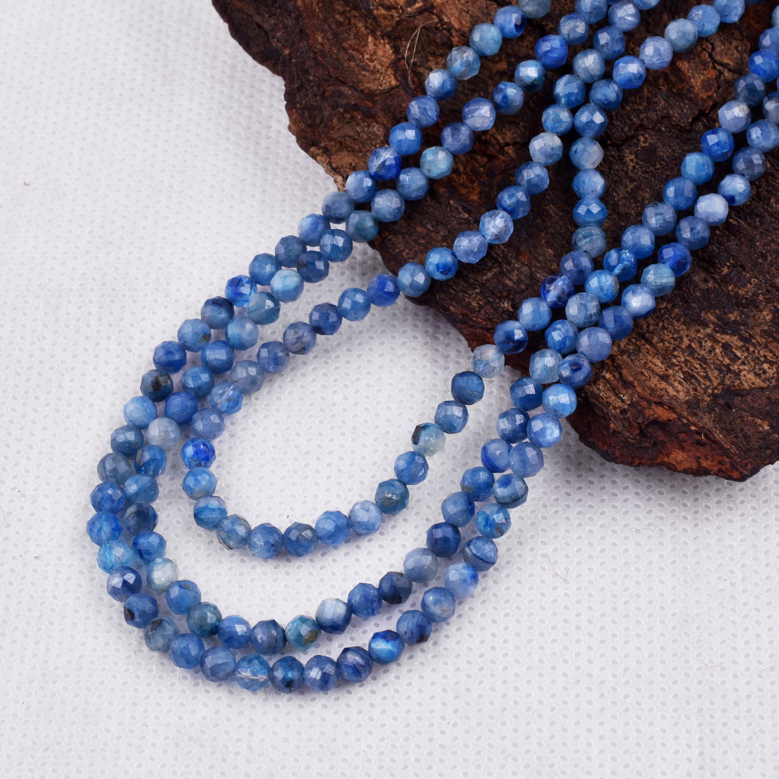 Natural Kyanite Necklace 4 MM Round Faceted 3 String Beads Gemstone: Natural Kyanite Gemstone 4 MM Round 3 Strings Faceted Beads Adjustable Necklace Product Type : Necklace Main Stone : Kyanite Main Stone Shape : Round Main Stone Size : 4 MM Beads Type : Faceted