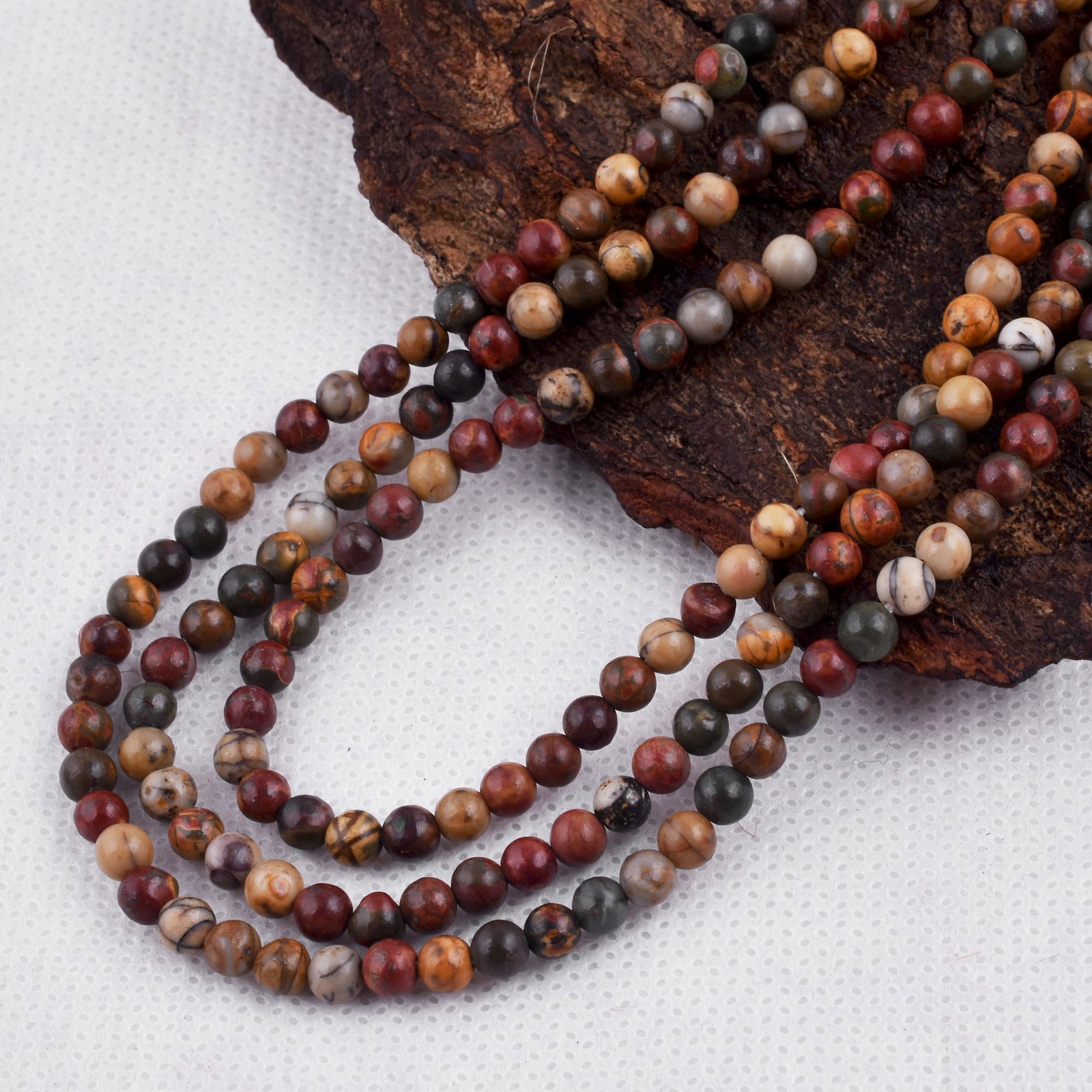 Natural Picasso Jasper Necklace 4 MM Round Smooth 3 String Beads Gemstone: Natural Picasso Jasper Gemstone 4 MM Round 3 Strings Smooth Beads Adjustable Necklace Product Type : Necklace Main Stone : Picasso Jasper Main Stone Shape : Round Main Stone Size : 4 MM Beads Type : <