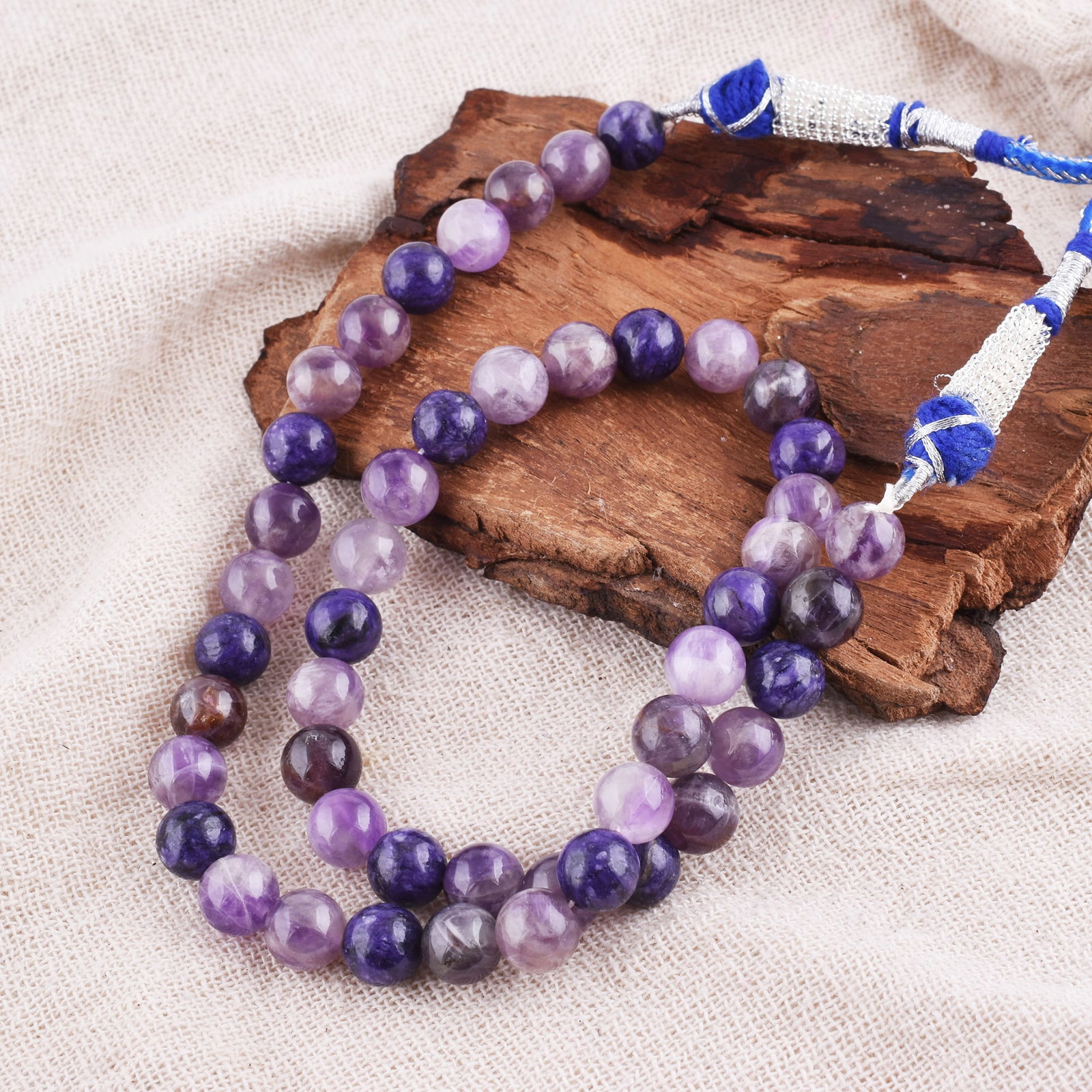 Natural Charoite Necklace 8 MM Round Smooth Beads Gemstone: NATURAL CHAROITE GEMSTONE 8 MM ROUND SMOOTH BEADS ADJUSTABLE NECKLACE PRODUCT TYPE : NECKLACE MAIN STONE : CHAROITE MAIN STONE SHAPE : ROUND MAIN STONE SIZE : 8 MM BEADS TYPE : SMOOTH BEADS