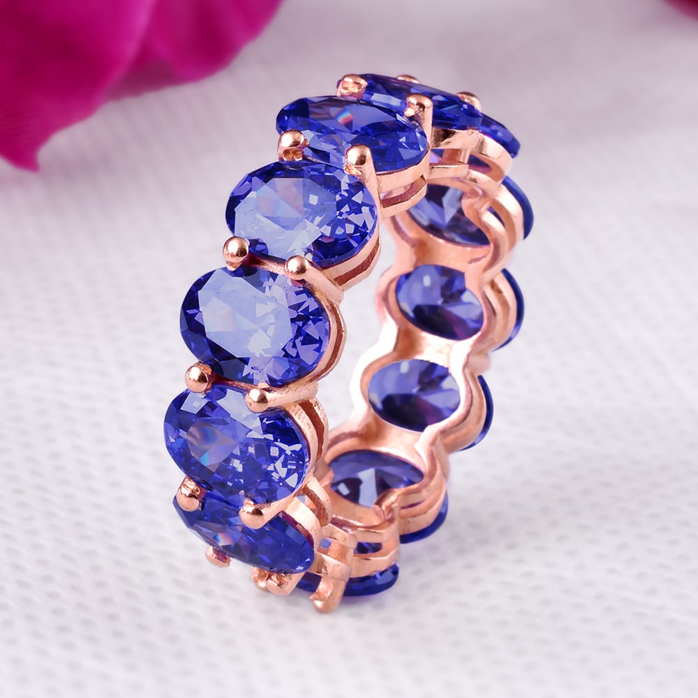 Natural Blue Sapphire 14 KT Rose Gold Eternity Band Ring: NATURAL BLUE SAPPHIRE 14 KT ROSE GOLD ETERNITY BAND RING JEWELRY TYPE : RING MAIN STONE : BLUE SAPPHIRE MAIN STONE SHAPE & SIZE : OVAL 7x5 MM MAIN STONE COLOR : BLUE METAL TYPE : SOLID ROSE GOLD