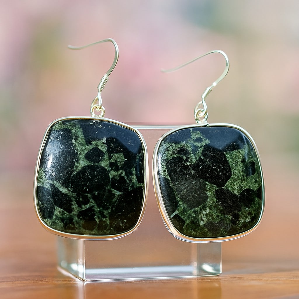 BLACK TOURMALINE 92.5 STERLING SILVER EARRING: BLACK TOURMALINE 92.5 STERLING SILVER EARRING Product Type : EARRING Main Stone : BLACK TOURMALINE Main Stone Shape : CUSHION Main Stone Size : 27X26 MM Main Stone Color : BLACK Metal : STERLING SILVE