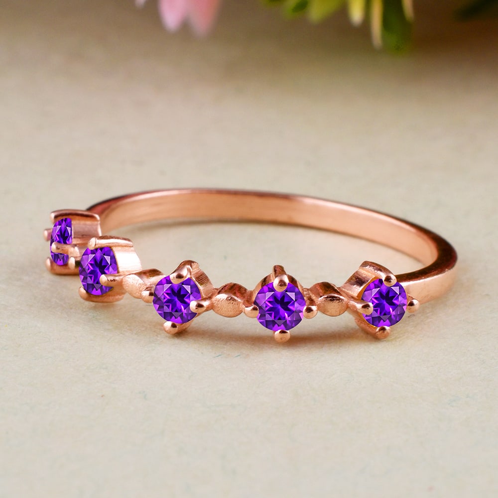 Natural Amethyst 14 KT Rose Gold Ring: Natural Amethyst 14 KT Rose Gold Ring Jewelry Type : Ring Main Stone : Amethyst Main Stone Shape & Size : Round 2.5 MM Main Stone Color : Purple