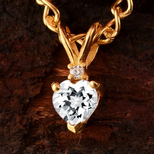 Natural White Topaz & Diamond 14 KT Yellow Gold Pendant: Natural White Topaz & Diamond 14 KT Yellow Gold Pendant Jewelry Type : Pendant Main Stone : White Topaz & Diamond Main Stone Shape & Size : Heart 5x5 MM Main Stone Color : White Diamond Shape & Size :