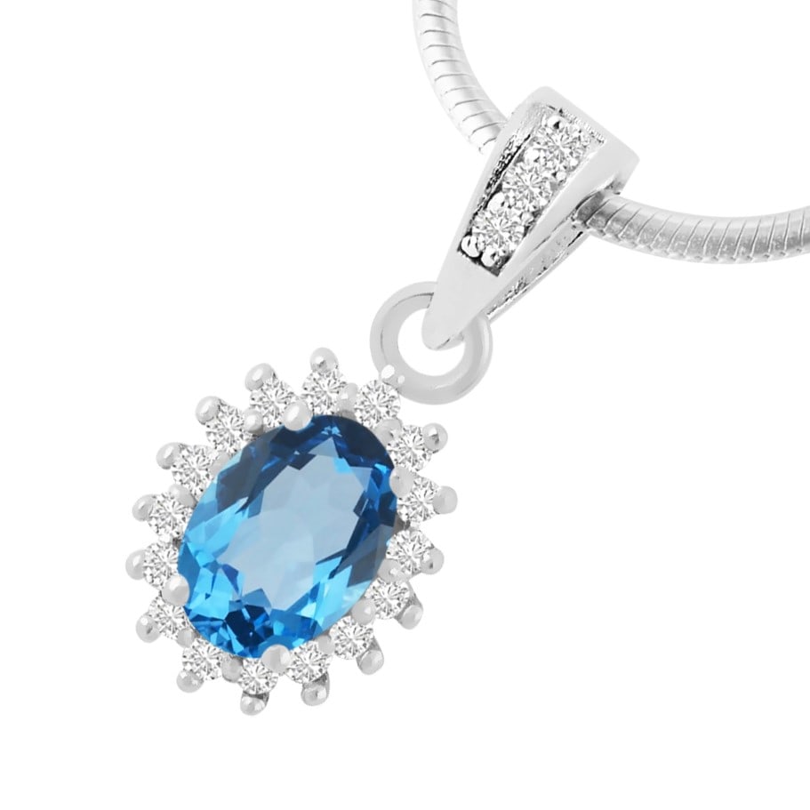 Natural Blue Topaz & Diamond 14 KT White Gold Pendant: Natural Blue Topaz & Diamond 14 KT White Gold Pendant Jewelry Type : Pendant Main Stone : Blue Topaz & Diamond Main Stone Shape & Size : Oval 7x5 MM Main Stone Color : Blue Diamond Shape & Size : R