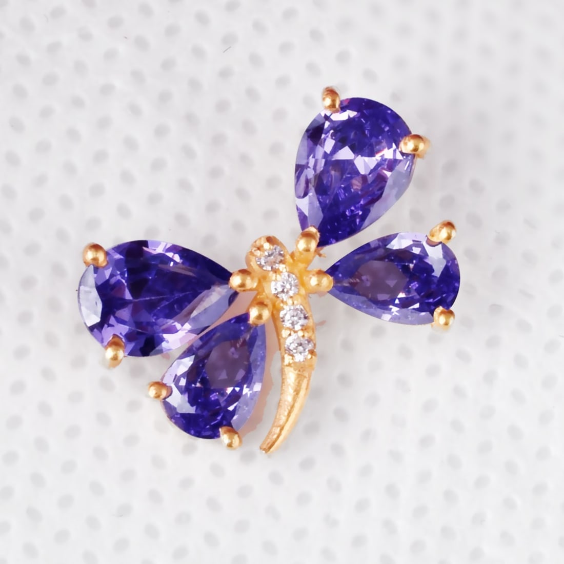 Natural Blue Sapphire & Diamond 14 KT Yellow Gold Butterfly Pendant: Natural Blue Sapphire & Diamond 14 KT Yellow Gold Butterfly Pendant Jewelry Type : Pendant Main Stone : Blue Sapphire & Diamond Main Stone Shape & Size : Pear 7x5 & 6x4 MM Main Stone Color : Blue Diam