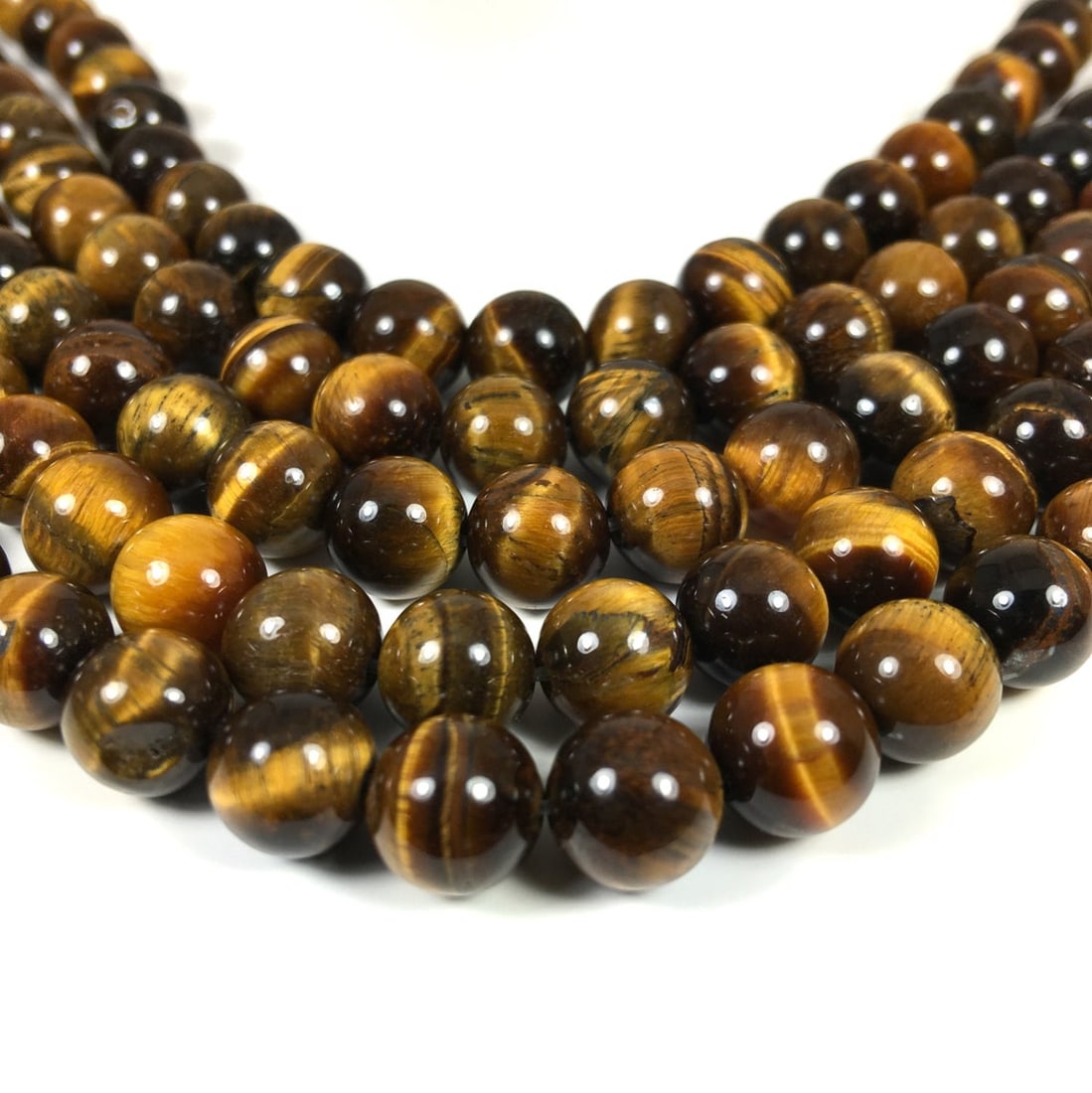 Natural Tiger's Eye Gemstone 4 mm Round Smooth Plain Beads 10 Strand: Natural Tiger's Eye Gemstone 4 mm Round Smooth Plain Beads 10 Strand Product Type : Loose Beads Strand Gemstone : Tiger's Eye Beads Shape : Round Smooth Plain Beads Size : 4 mm Quantity :