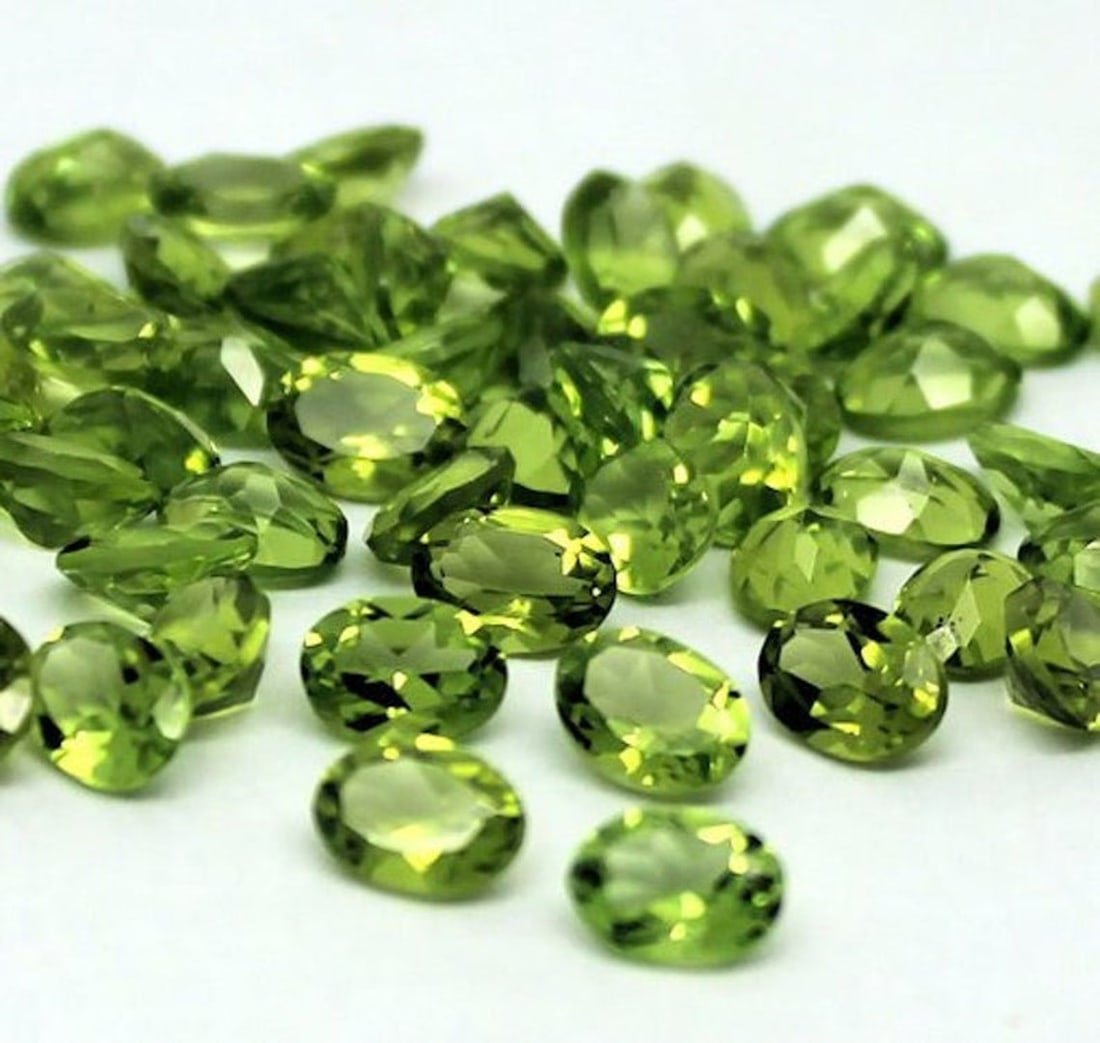 Peridot 9x7 MM Oval Faceted Cut 20 Pieces (1 of 2)