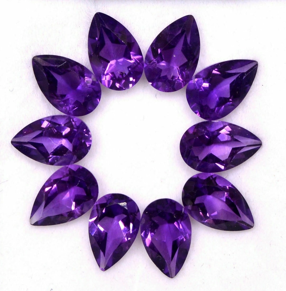 Amethyst 8x6 MM Pear Faceted Cut 50 Pieces: Natural Amethyst 8x6 MM Pear Faceted Cut 50 Pieces Gemstone : Amethyst Shape : Pear Size : 8x6 MM Color : Purple Type : Faceted Cut Quantity : 50 Pieces Weight : 49.5 C