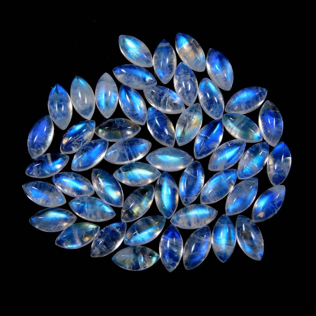 Rainbow Moonstone 4x8 MM Marquise Cabochon 25 Pieces: Natural Rainbow Moonstone 4x8 MM Marquise Cabochon 25 Pieces Gemstone : Rainbow Moonstone Shape : Marquise Size : 4x8 MM Color : Multicolor Type : Cabochon Quantity : 25 Pieces