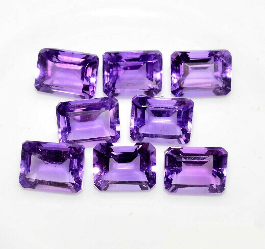 Amethyst 10x8 MM Octagon Faceted Cut 15 Pieces: Natural Amethyst 10x8 MM Octagon Faceted Cut 15 Pieces Gemstone : Amethyst Shape : Octagon Size : 10x8 MM Color : Purple Type : Faceted Cut Quantity : 15 Pieces Weight : </