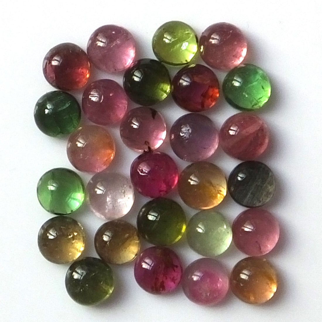 Multi Tourmaline 5 MM Round Cabochon 25 Pieces: Natural Multi Tourmaline 5 MM Round Cabochon 25 Pieces Gemstone : Multi Tourmaline Shape : Round Size : 5 MM Color : Multi Color Type : Cabochon Quantity : 25 Pieces Weight