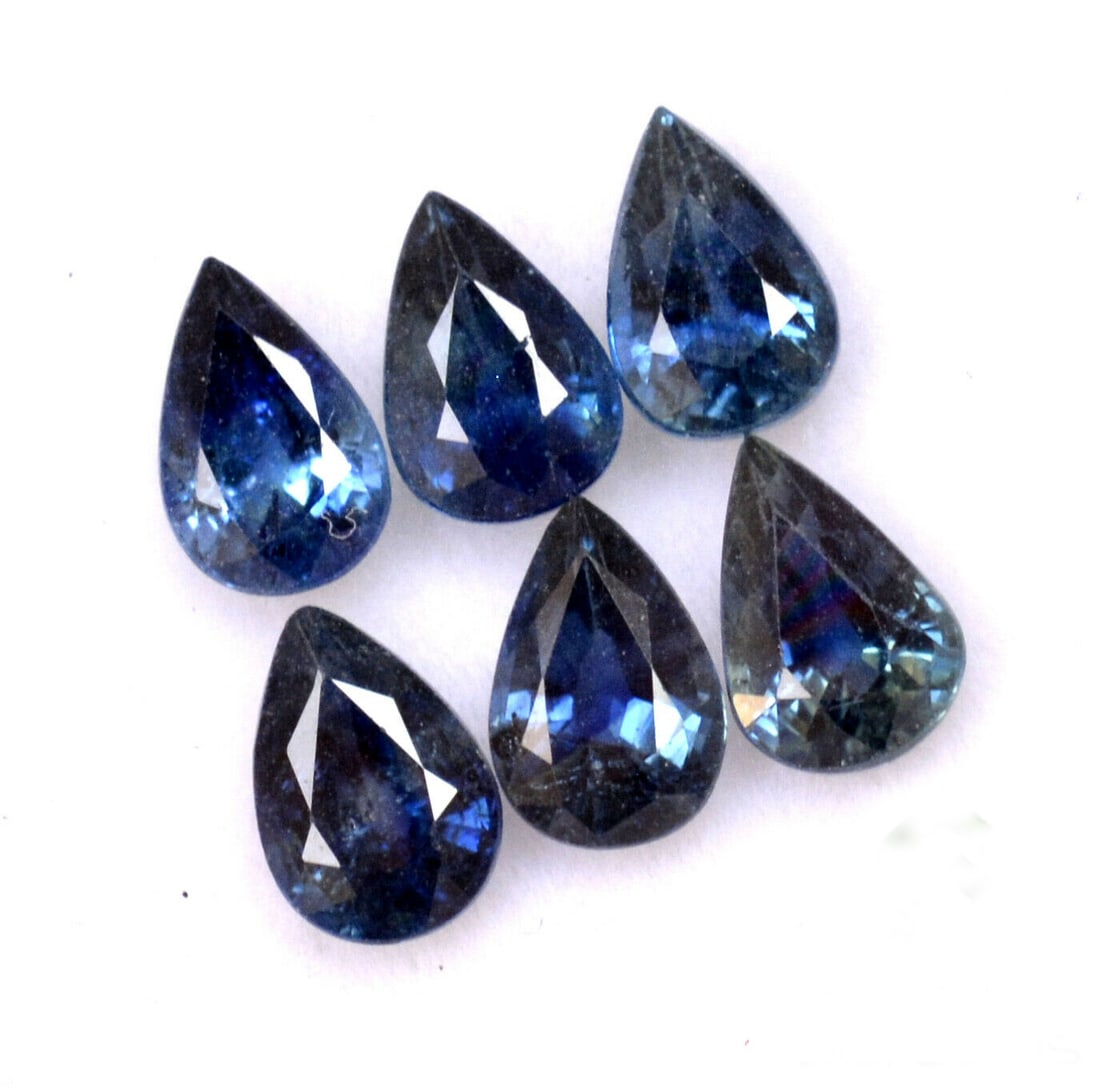 Blue Sapphire 7x5 MM Pear Faceted Cut 15 Pieces: Natural Blue Sapphire 7x5 MM Pear Faceted Cut 15 Pieces Gemstone : Blue Sapphire Shape : Pear Size : 7x5 MM Color : Blue Type : Faceted Cut Quantity : 15 Pieces Weight : </