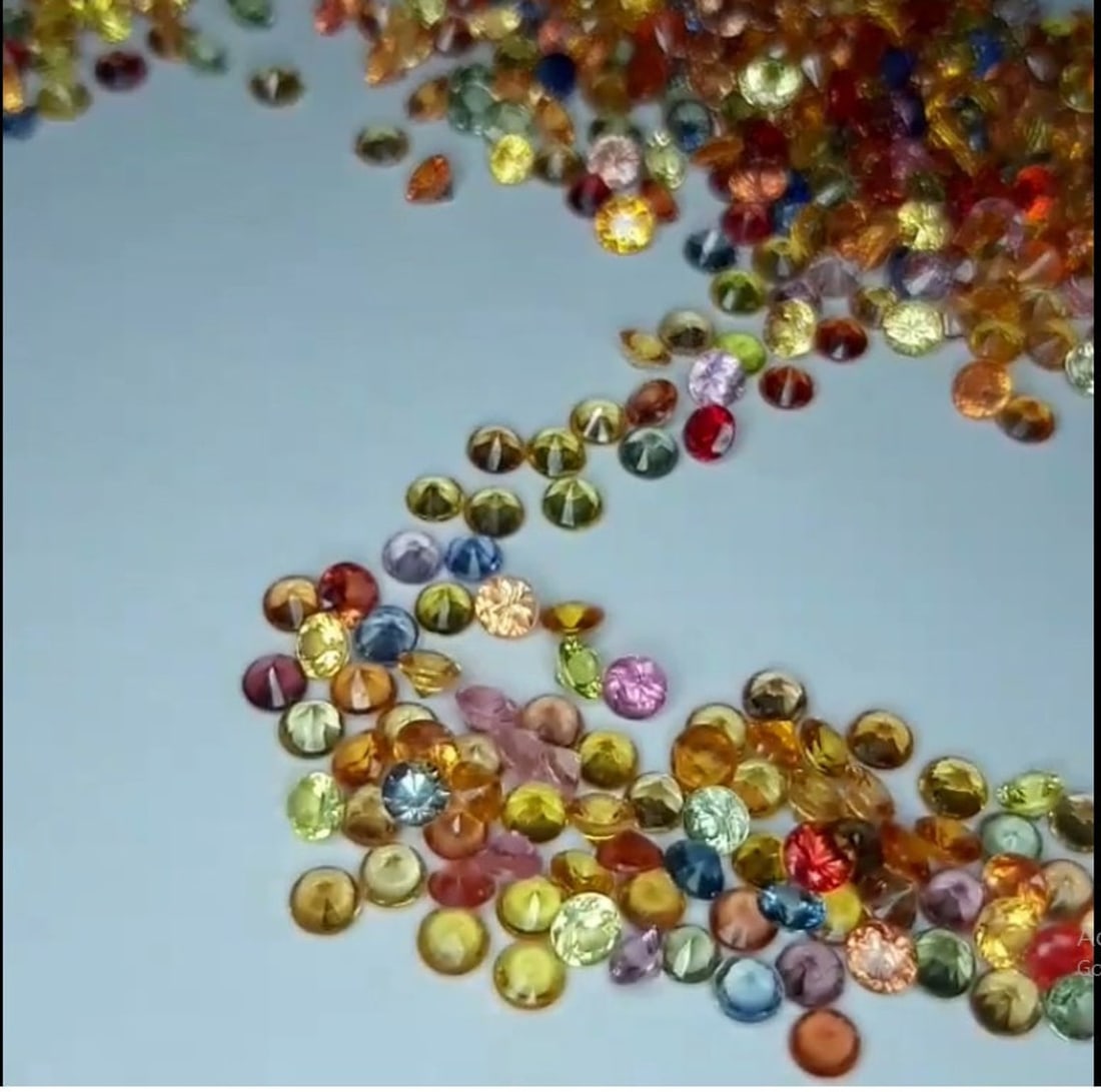 Multi Sapphire 1.25 MM Round Diamond Cut 250 Pieces: Natural Multi Sapphire 1.25 MM Round Diamond Cut 250 Pieces Gemstone : Multi Sapphire Shape : Round Size : 1.25 MM Color : Multi Color Type : Diamond Cut Quantity : 250 Pieces