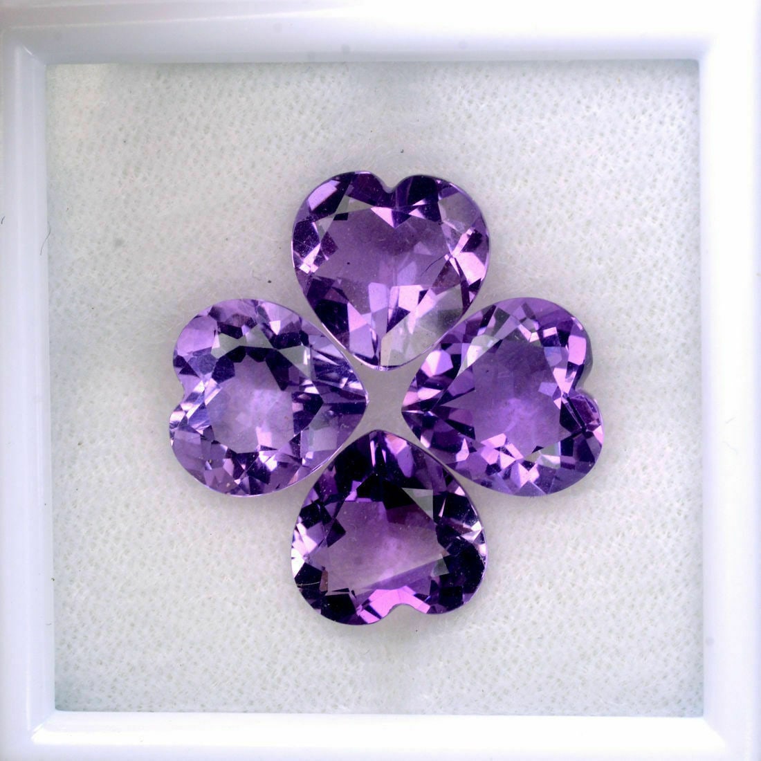 Amethyst 7x7 MM Heart Faceted Cut 25 Pieces: Natural Amethyst 7x7 MM Heart Faceted Cut 25 Pieces Gemstone : Amethyst Shape : Heart Size : 7x7 MM Color : Purple Type : Faceted Cut Quantity : 25 Pieces Weight : 28.5