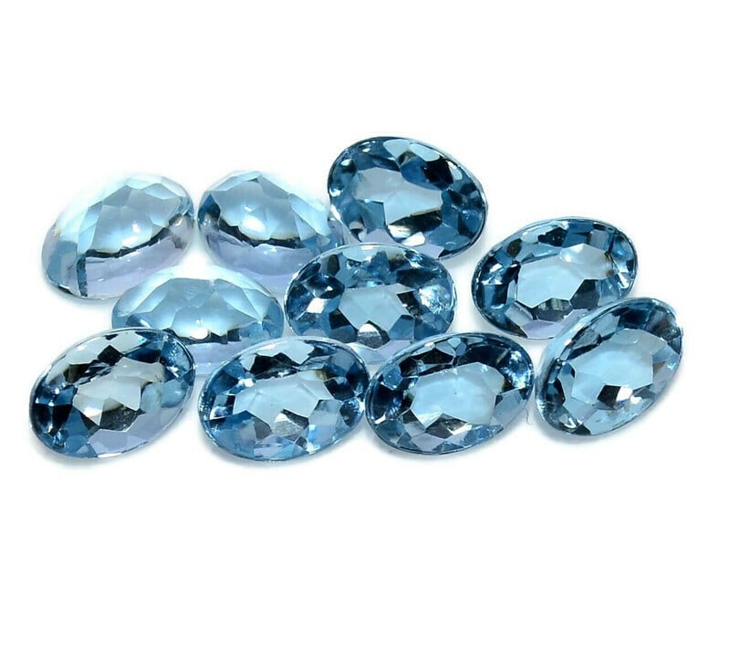 Blue Topaz 9x7 MM Oval Faceted Cut 15 Pieces: Natural Blue Topaz 9x7 MM Oval Faceted Cut 15 Pieces Gemstone : Blue Topaz Shape : Oval Size : 9x7 MM Color : Sky Blue Type : Faceted Cut Quantity : 15 Pieces Weight :