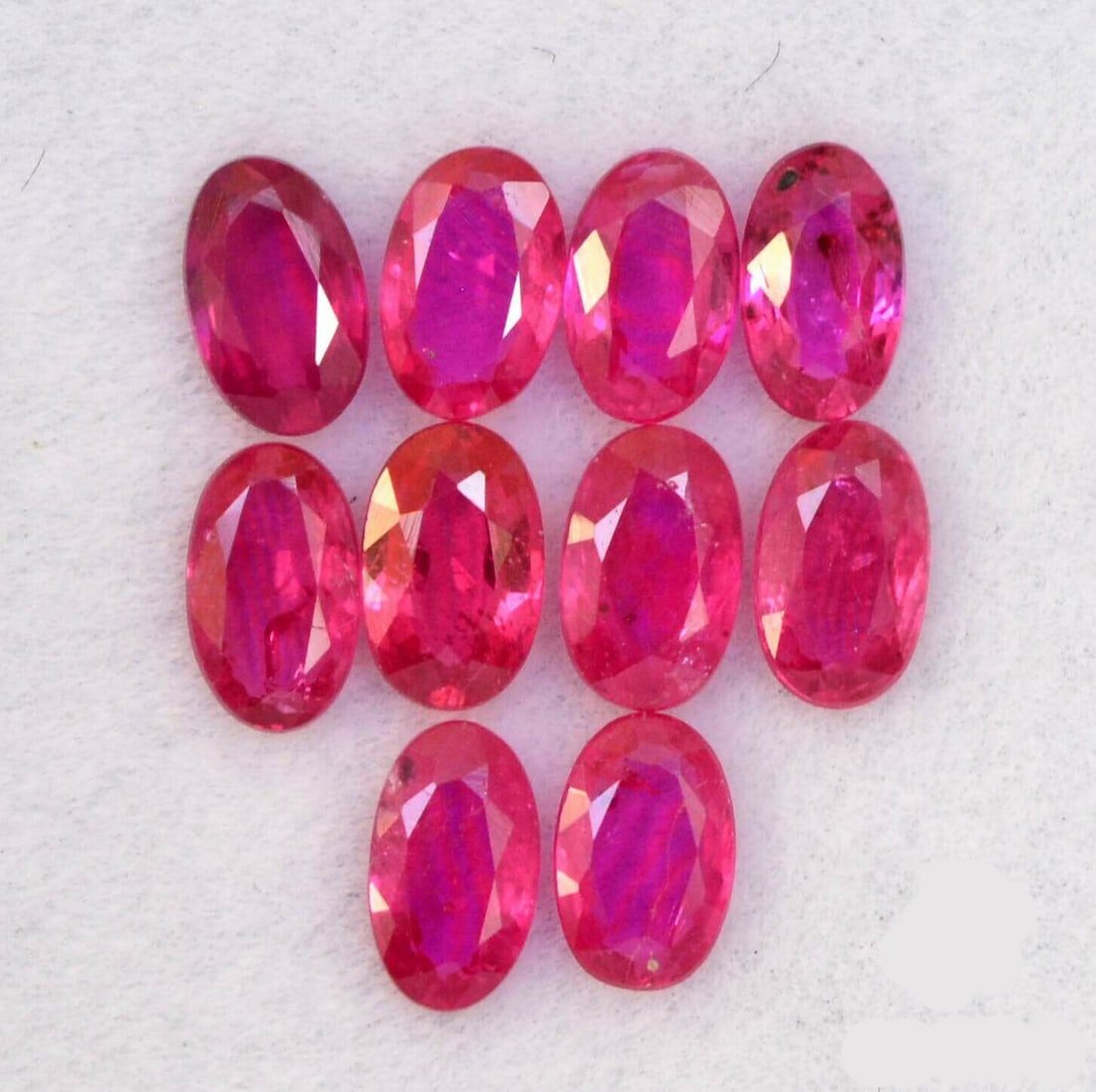 Ruby 7x5 MM Oval Faceted Cut 15 Pieces: Natural Ruby 7x5 MM Oval Faceted Cut 15 Pieces Gemstone : Ruby Shape : Oval Size : 7x5 MM Color : Red Type : Faceted Cut Quantity : 15 Pieces Weight : 16.95 Carats <