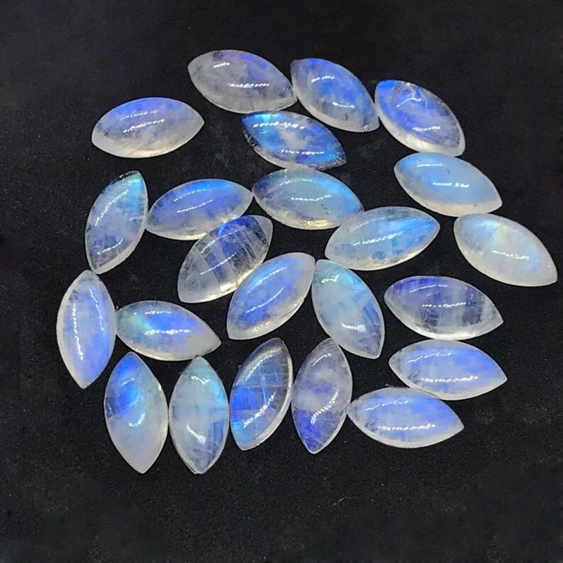 Rainbow Moonstone 5x10 MM Marquise Cabochon 25 Pieces: Natural Rainbow Moonstone 5x10 MM Marquise Cabochon 25 Pieces Gemstone : Rainbow Moonstone Shape : Marquise Size : 5x10 MM Color : Multicolor Type : Cabochon Quantity : 25 Pieces