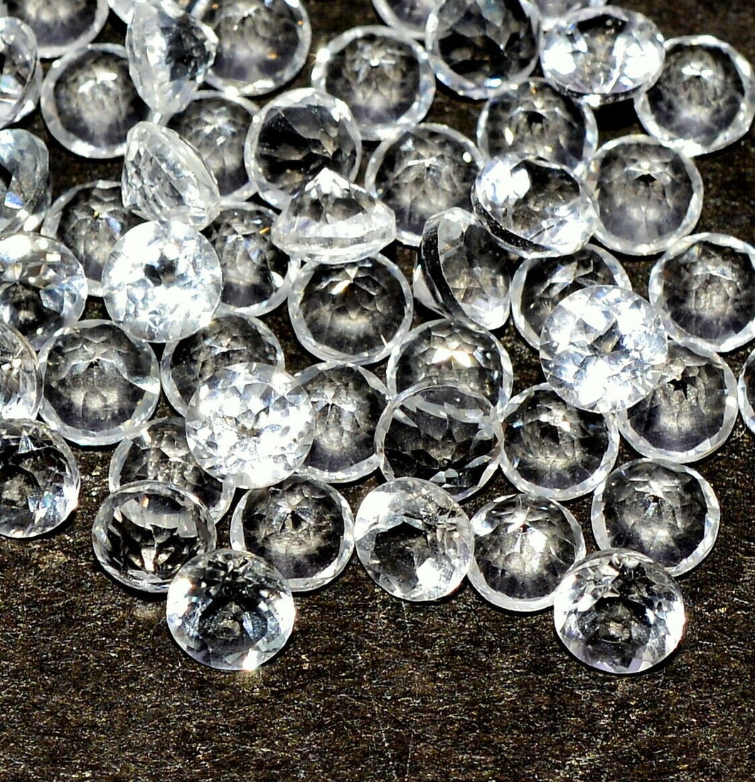 White Topaz 6 MM Round Faceted Cut 25 Pieces: Natural White Topaz 6 MM Round Faceted Cut 25 Pieces Gemstone : White Topaz Shape : Round Size : 6 MM Color : White (Colorless) Type : Faceted Cut Quantity : 25 Pieces Weig