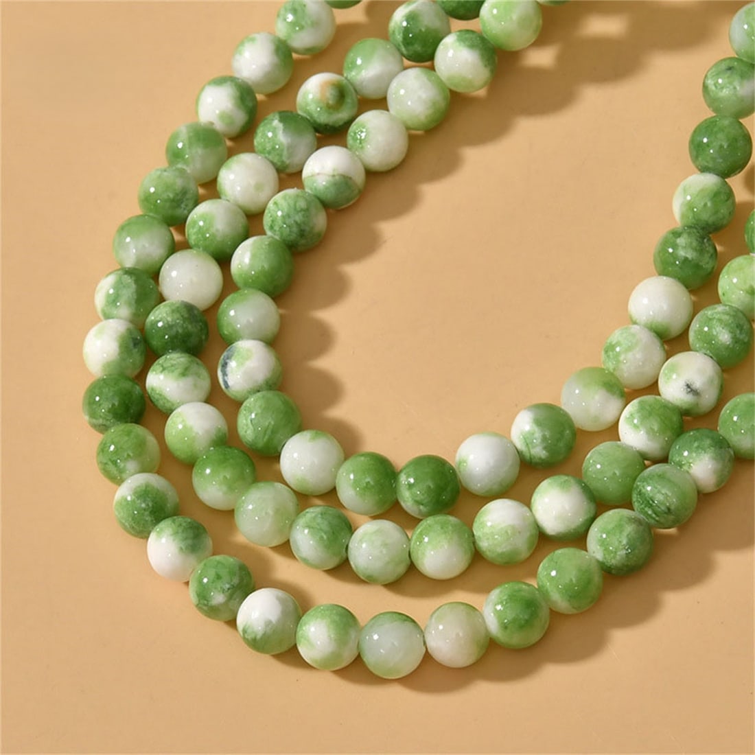 Natural Green White Persian Jade Gemstone 6 MM Round Smooth Plain Beads 10 Strand: Natural Green White Persian Jade Gemstone 6 MM Round Smooth Plain Beads 10 Strand Product Type : Loose Beads Strand Gemstone : Persian Jade Beads Shape : Round Smooth Plain Beads Size : 6 MM Q