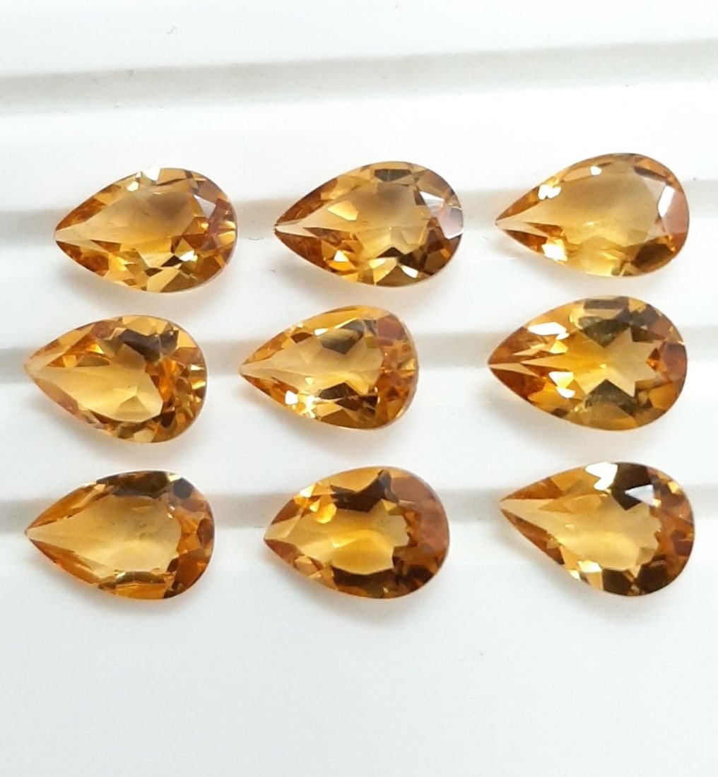 Citrine 9x7 MM Pear Faceted Cut 25 Pieces: Natural Citrine 9x7 MM Pear Faceted Cut 25 Pieces Gemstone : Citrine Shape : Pear Size : 9x7 MM Color : Yellow Type : Faceted Cut Quantity : 25 Pieces Weight : 39.25 Ca
