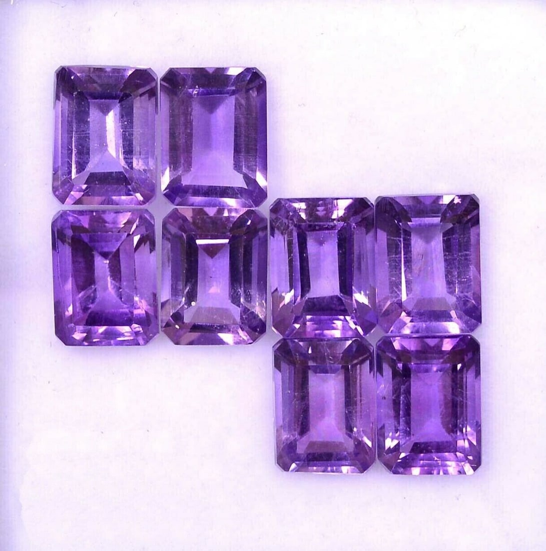 Amethyst 9x7 MM Octagon Faceted Cut 15 Pieces: Natural Amethyst 9x7 MM Octagon Faceted Cut 15 Pieces Gemstone : Amethyst Shape : Octagon Size : 9x7 MM Color : Purple Type : Faceted Cut Quantity : 15 Pieces Weight :
