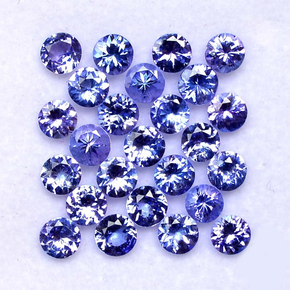 Tanzanite 4.5 MM Round Faceted Cut 25 Pieces: Natural Tanzanite 4.5 MM Round Faceted Cut 25 Pieces Gemstone : Tanzanite Shape : Round Size : 4.5 MM Color : Blue Type : Faceted Cut Quantity : 25 Pieces Weight : 9 Ca