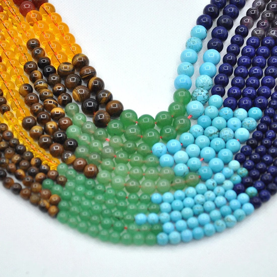 Natural Multi Gemstone Chakra Gemstone 10 mm Round Smooth Plain Beads 10 Strand: Natural Multi Gemstone Chakra Gemstone 10 mm Round Smooth Plain Beads 10 Strand Product Type : Loose Beads Strand Gemstone : Multi Gemstone Chakra Beads Shape : Round Smooth Plain Beads Size : 10 mm