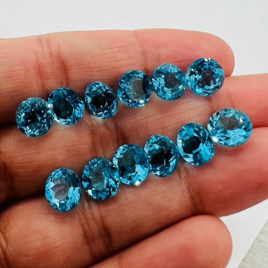 Swiss Blue Topaz 7 MM Round Faceted Cut 10 Pieces: Natural Swiss Blue Topaz 7 MM Round Faceted Cut 10 Pieces Gemstone : Swiss Blue Topaz Shape : Round Size : 7 MM Color : Blue Type : Faceted Cut Quantity : 10 Pieces Weight