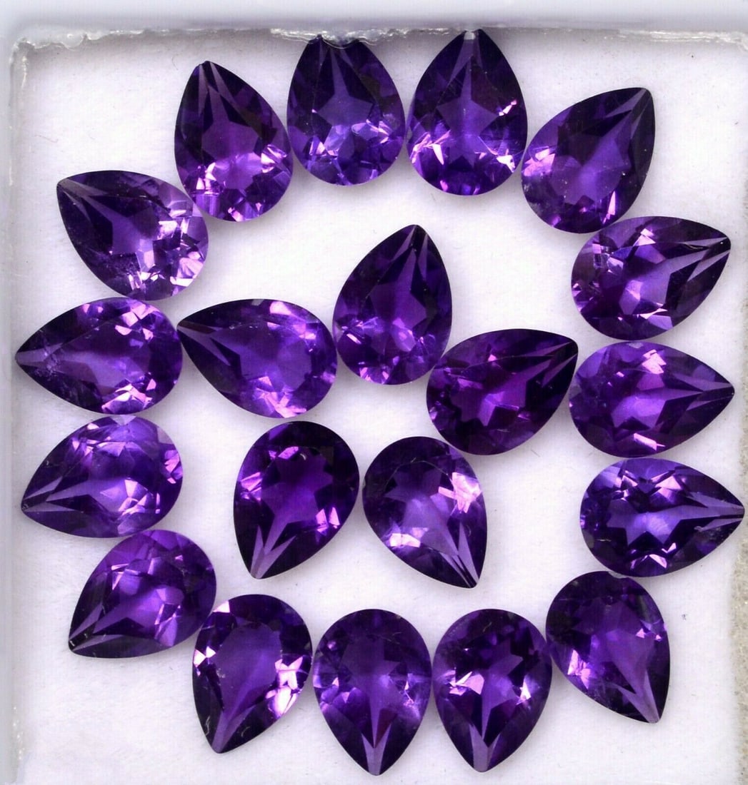 Amethyst 7x5 MM Pear Faceted Cut 50 Pieces: Natural Amethyst 7x5 MM Pear Faceted Cut 50 Pieces Gemstone : Amethyst Shape : Pear Size : 7x5 MM Color : Purple Type : Faceted Cut Quantity : 50 Pieces Weight : 31 Car