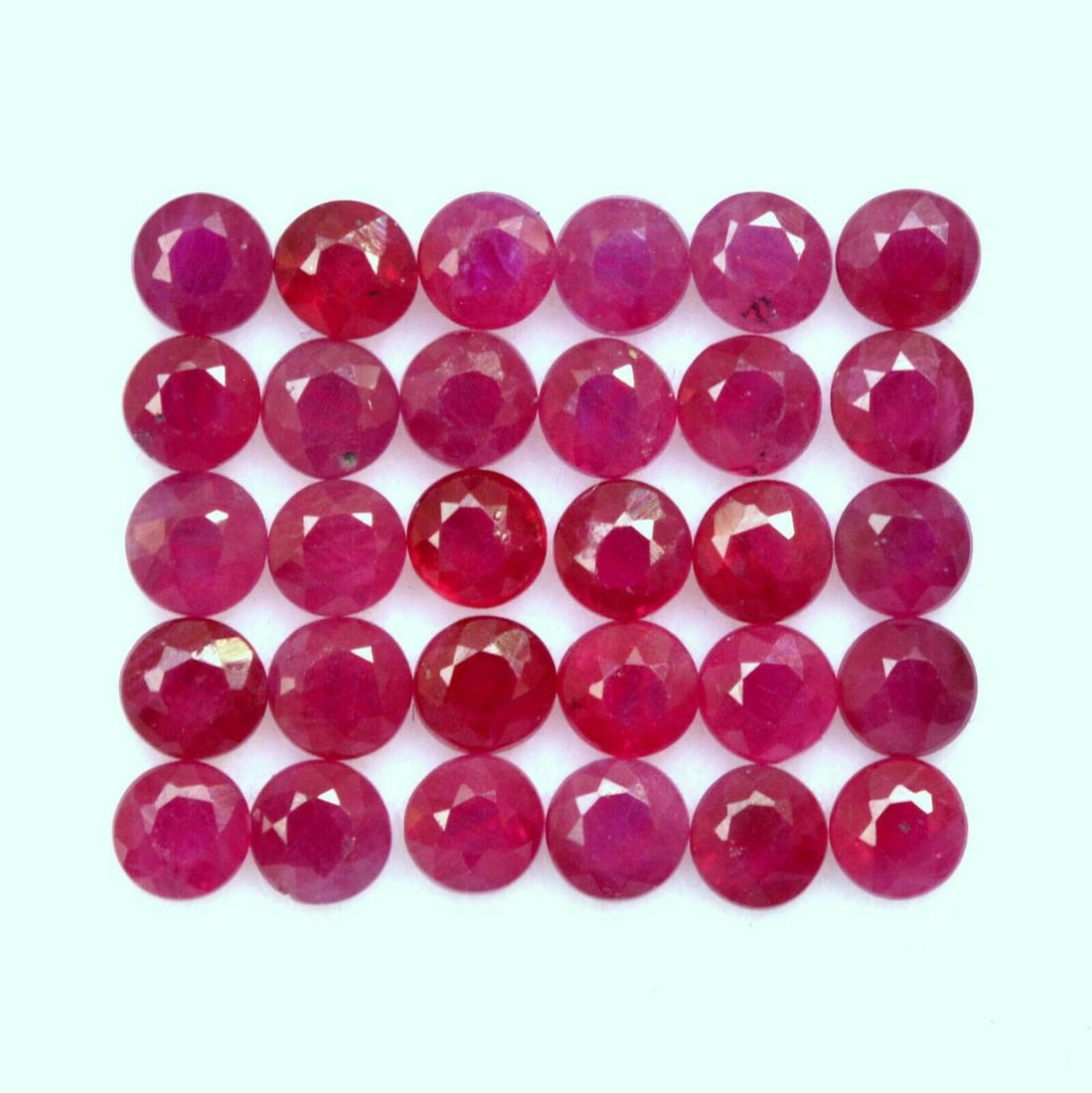 Ruby 3.5 MM Round Faceted Cut 50 Pieces: Natural Ruby 3.5 MM Round Faceted Cut 50 Pieces Gemstone : Ruby Shape : Round Size : 3.5 MM Color : Red Type : Faceted Cut Quantity : 50 Pieces Weight : 11 Carats