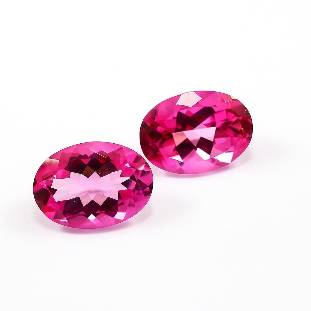 Natural Pink Topaz Oval Faceted Cut 30.55 Cts. Gemstone Pair: Natural Pink Topaz Oval Faceted Cut 30.55 Cts. Gemstone Pair Gemstone : Pink Topaz Shape : Oval Size : 18x12.5x9 MM Color : Pink Type : Faceted Cut Quantity : 2 Pieces Weigh