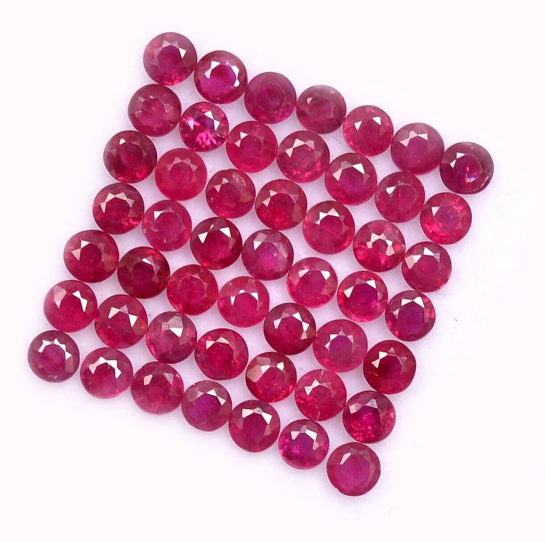 Ruby 2.5 MM Round Faceted Cut 50 Pieces: Natural Ruby 2.5 MM Round Faceted Cut 50 Pieces Gemstone : Ruby Shape : Round Size : 2.5 MM Color : Red Type : Faceted Cut Quantity : 50 Pieces Weight : 7.5 Carats <