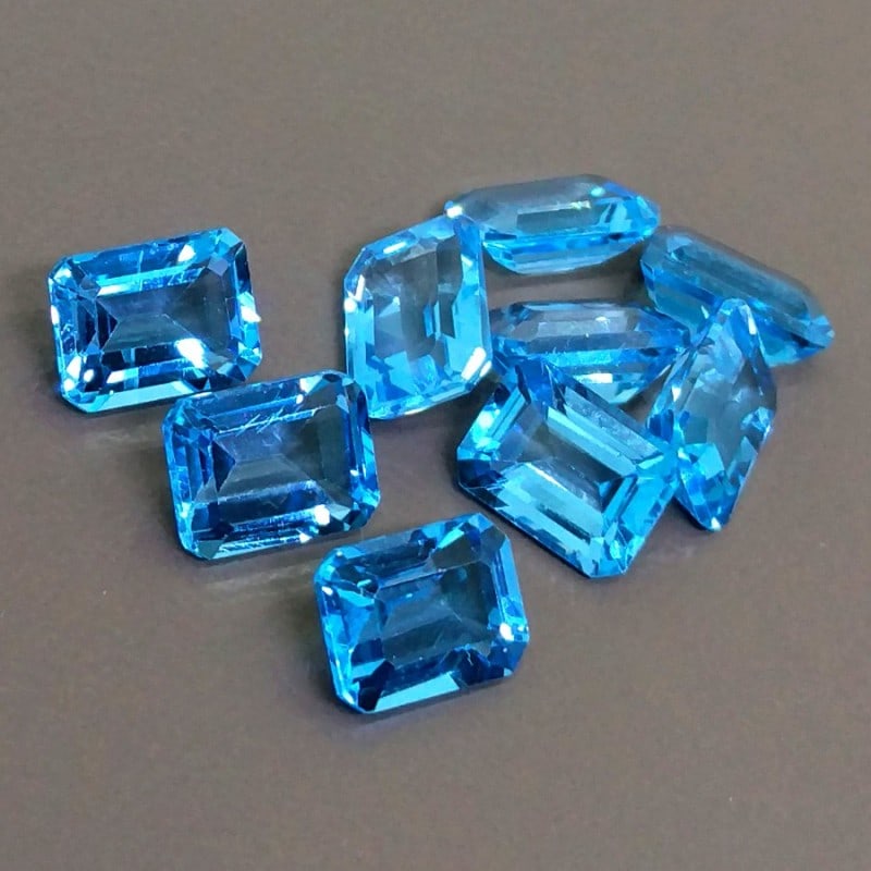 Swiss Blue Topaz 7x5 MM Octagon Faceted Cut 15 Pieces: Natural Swiss Blue Topaz 7x5 MM Octagon Faceted Cut 15 Pieces Gemstone : Swiss Blue Topaz Shape : Octagon Size : 7x5 MM Color : Sky Blue Type : Faceted Cut Quantity : 15 Pieces