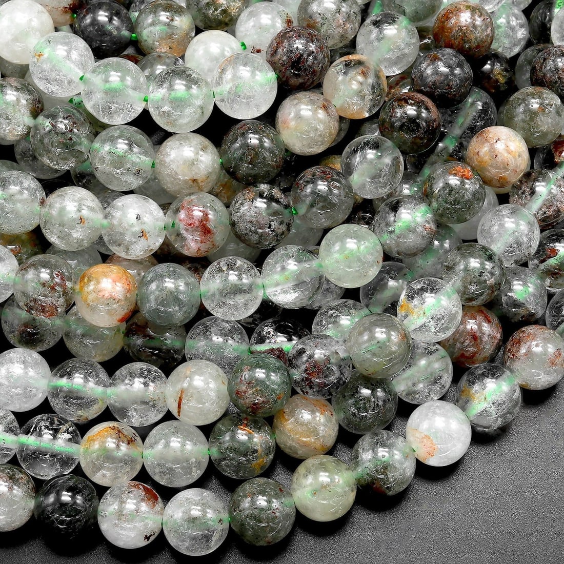 Natural Green Phantom Quartz Lodalite Gemstone 8 MM Round Smooth Plain Beads 10 Strand: Natural Green Phantom Quartz Lodalite Gemstone 8 MM Round Smooth Plain Beads 10 Strand Product Type : Loose Beads Strand Gemstone : Phantom Quartz Beads Shape : Round Smooth Plain Beads Size : 8 MM<