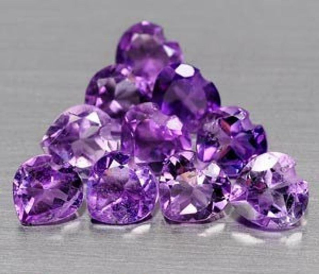 Amethyst 9x9 MM Heart Faceted Cut 15 Pieces: Natural Amethyst 9x9 MM Heart Faceted Cut 15 Pieces Gemstone : Amethyst Shape : Heart Size : 9x9 MM Color : Purple Type : Faceted Cut Quantity : 15 Pieces Weight : 29.4