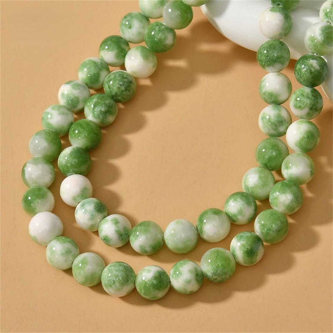 Natural Green White Persian Jade Gemstone 8 MM Round Smooth Plain Beads 10 Strand: Natural Green White Persian Jade Gemstone 8 MM Round Smooth Plain Beads 10 Strand Product Type : Loose Beads Strand Gemstone : Persian Jade Beads Shape : Round Smooth Plain Beads Size : 8 MM Q