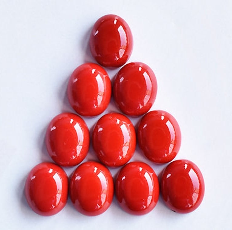 Red Coral 4x3 MM Oval Cabochon 50 Pieces: Natural Red Coral 4x3 MM Oval Cabochon 50 Pieces Gemstone : Red Coral Shape : Oval Size : 4x3 MM Color : Red Type : Cabochon Quantity : 50 Pieces Weight : 10 Carats