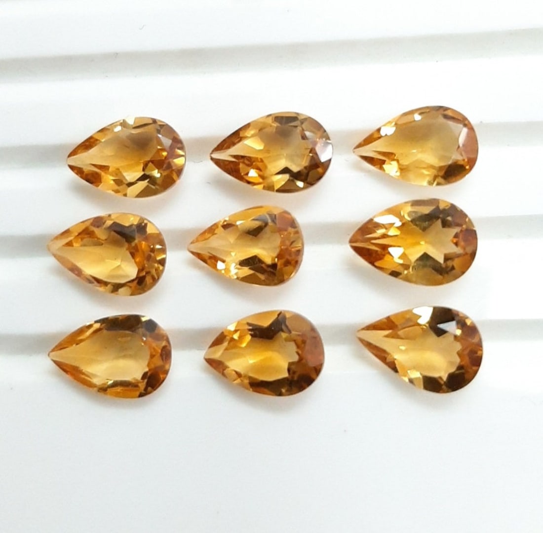 Citrine 9x6 MM Pear Faceted Cut 25 Pieces: Natural Citrine 9x6 MM Pear Faceted Cut 25 Pieces Gemstone : Citrine Shape : Pear Size : 9x6 MM Color : Yellow Type : Faceted Cut Quantity : 25 Pieces Weight : 29 Carat