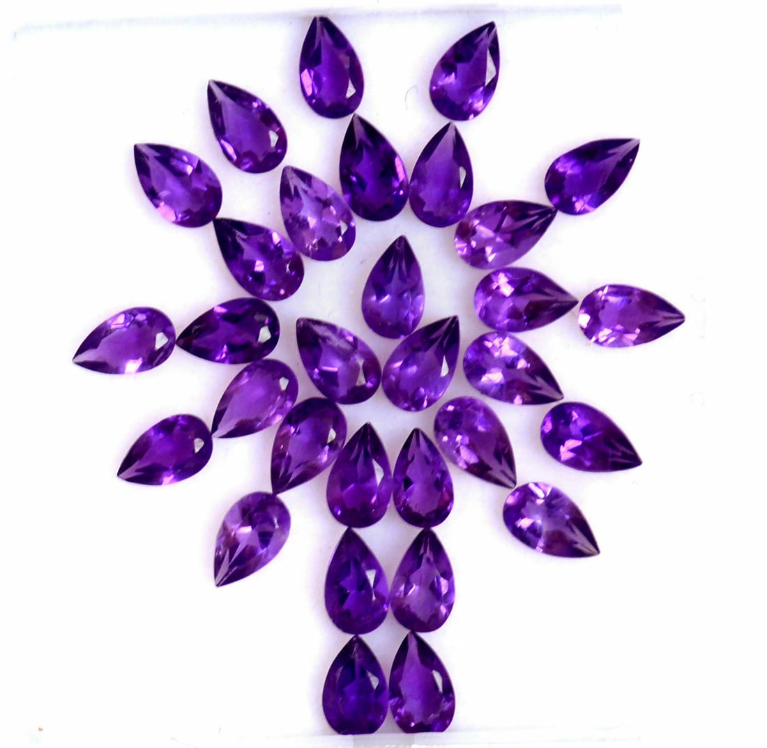 Amethyst 8x5 MM Pear Faceted Cut 50 Pieces: Natural Amethyst 8x5 MM Pear Faceted Cut 50 Pieces Gemstone : Amethyst Shape : Pear Size : 8x5 MM Color : Purple Type : Faceted Cut Quantity : 50 Pieces Weight : 36 Car